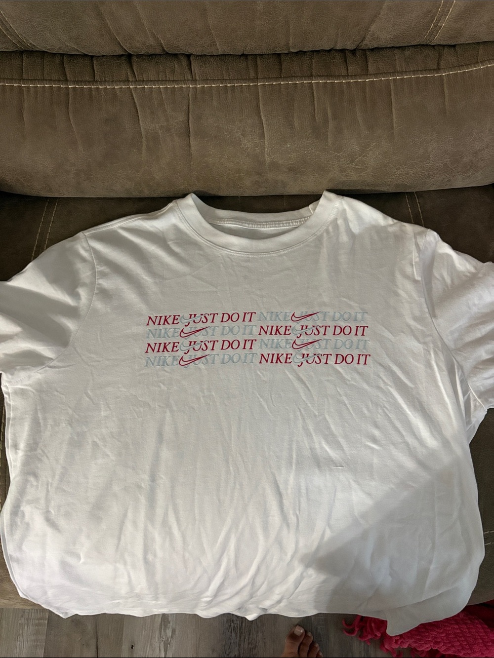 Nike White Crewneck Tee with Red 'Just Do It' Repeat Graphic